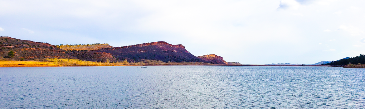 image showing a beautiful clear lake with a SolarBee® Lake Circulator in the distance.